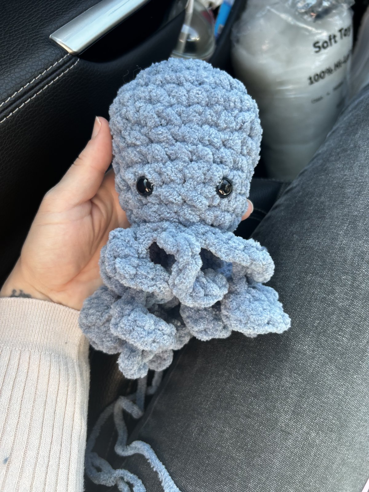 Dusty blue crochet octopus plushie with curly tentacles
